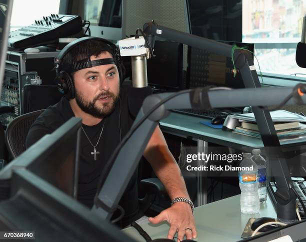 Singer/Songwriter Tyler Farr visits with SiriusXM's The Highway hosted by Storme Warren at SiriusXM Music City Studios on April 19, 2017 in...