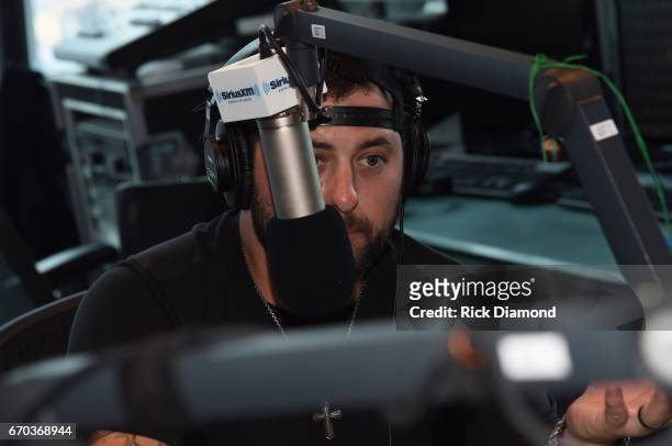 Singer/Songwriter Tyler Farr visits with SiriusXM's The Highway hosted by Storme Warren at SiriusXM Music City Studios on April 19, 2017 in...
