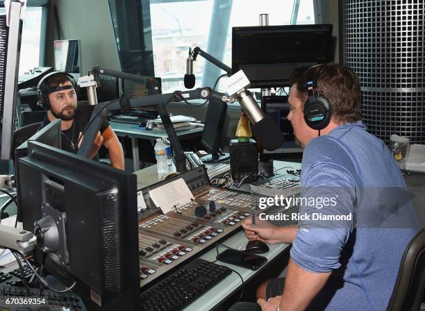 Singer/Songwriter Tyler Farr visits with Storme Warren during SiriusXM The Highway at SiriusXM Music City Studios on April 19, 2017 in Nashville,...