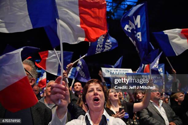 Far right supporters attend a presidential campaign rally by National Front Leader Marine Le Pen at the Dome De Marseille on April 19, 2017 in...