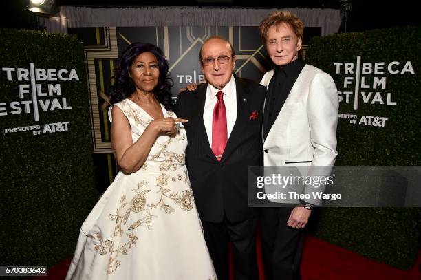 Aretha Franklin, Clive Davis and Barry Manilow pose for a portrait backstage at the "Clive Davis: The Soundtrack of Our Lives" Premiere during the...
