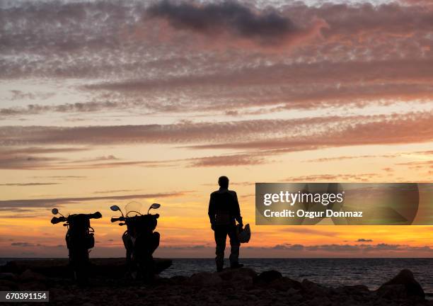 Man Standing Rider 61 Man Standing By Motorcycle Silhouette Stock Photos, High-Res ...