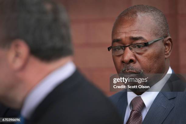 East Chicago Mayor Anthony Copeland joins other elected officials as they address the media after meeting with former residents and taking a brief...