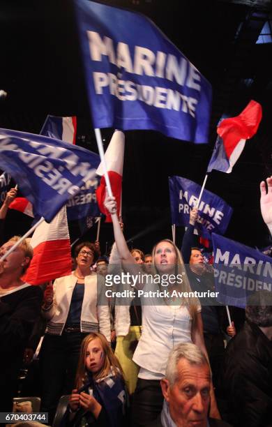 Far right supporters attend a presidential campaign rally by National Front Leader Marine Le Pen at the Dome De Marseille on April 19, 2017 in...