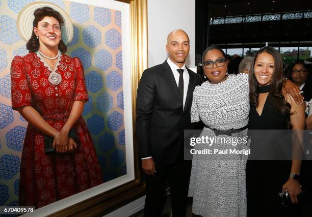 Oprah Winfrey , Dr. Jungmiwha Bullock and artist Kadir Nelson with his painting of Henrietta Lacks, attend the D.C. Premiere of HBO Films' "The...