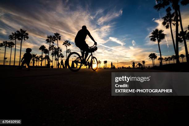 venice beach at sunset - venice beach stock pictures, royalty-free photos & images