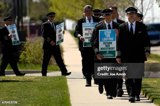 April 19: Captain Michael Maynard, MEC Vice Chairman leading his team to march with over 250 Frontier Airlines pilots picketing their corporate...