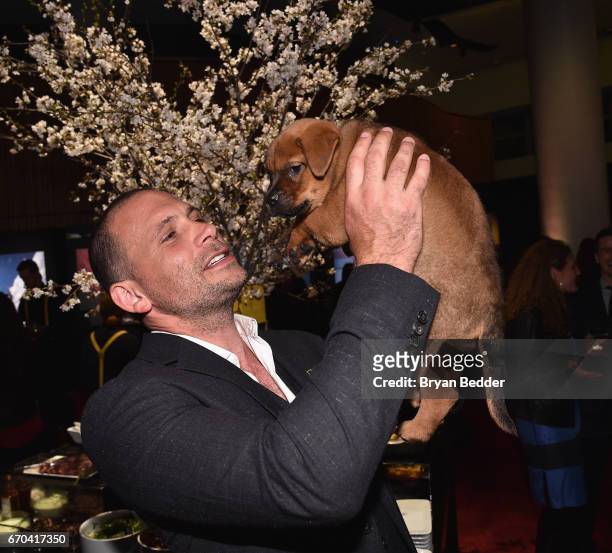 Actor Jeremy Sisto holds a puppy at National Geographic's Further Front Event at Jazz at Lincoln Center on April 19, 2017 in New York City.