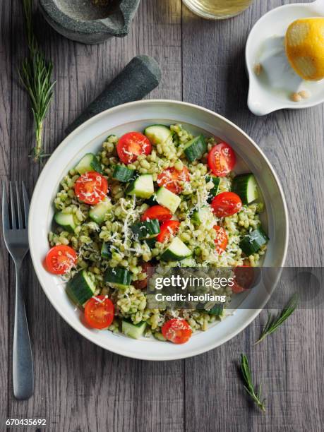 healthy pearl barley salad - pesto sauce stock pictures, royalty-free photos & images