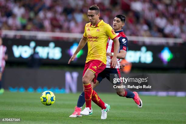 Alan Pulido of Chivas fights for the ball with Carlos Rodriguez of Morelia during the Final match between Chivas and Morelia as part of the Copa MX...