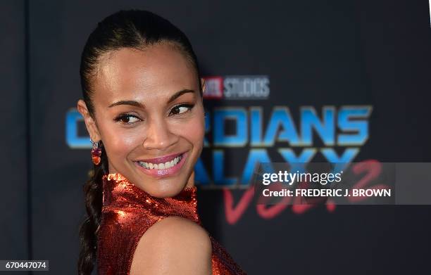 Actress Zoe Saldana arrives for the world premiere of the film "Guardians of the Galaxy Vol. 2" in Hollywood, California on April 19, 2017. / AFP...
