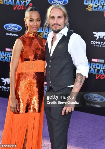 Zoe Saldana, Marco Perego arrives at the Premiere Of Disney And Marvel's "Guardians Of The Galaxy Vol. 2" at Dolby Theatre on April 19, 2017 in...