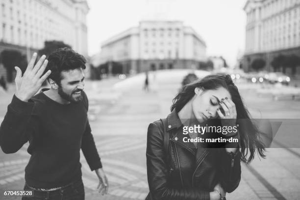 angry man yelling at his girlfriend - couple shouting stock pictures, royalty-free photos & images