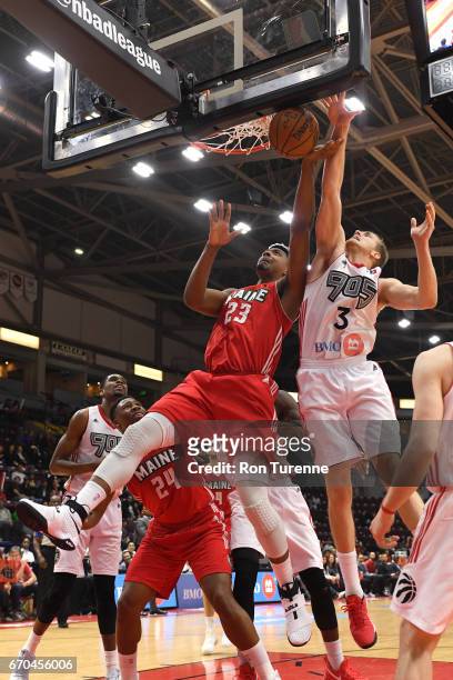 April 19 : E.J. Singler of the Raptors 905 goes up for the block against Jordan Mickey during the game against the Raptors 905 at the Hershey Centre...