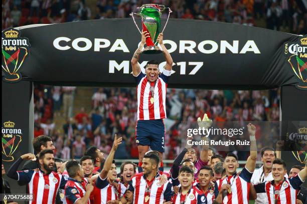 Carlos Salcido of Chivas lifts the trophy after winning the final match between Chivas and Morelia as part of the Copa MX Clausura 2017 at Chivas...