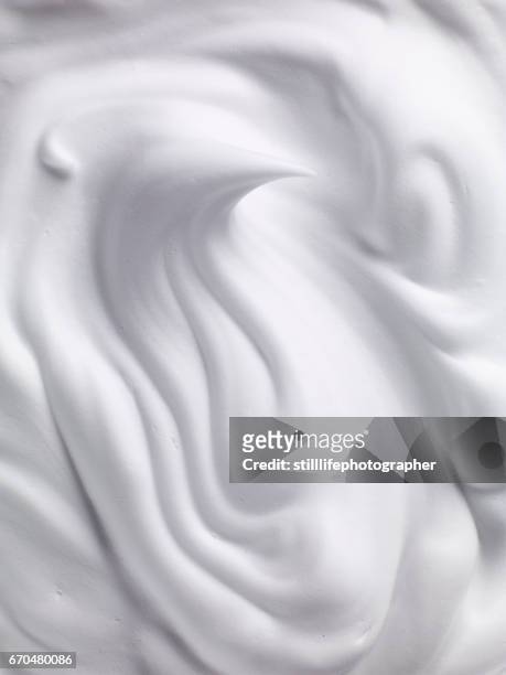 foam swirl - creme stock-fotos und bilder