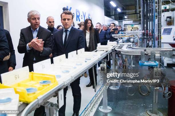 Founder and Leader of the political movement 'En Marche !' and candidate for the 2017 French Presidential Election Emmanuel Macron visits the Krys...