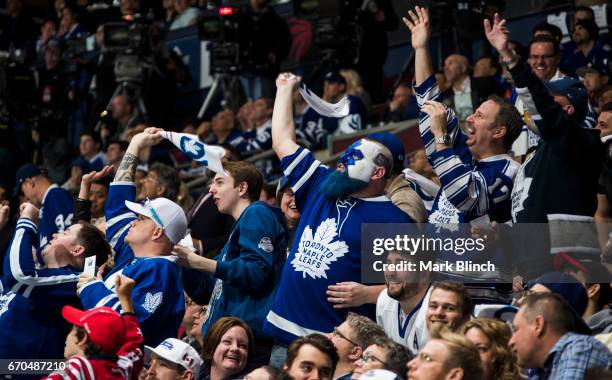 Toronto Maple Leafs fan Jason Maslakow, nicknamed "Dart Guy", cheers while the Maple Leafs play the Washington Capitals during the second period in...