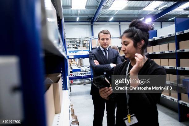 Founder and Leader of the political movement 'En Marche !' and candidate for the 2017 French Presidential Election Emmanuel Macron visits the Krys...