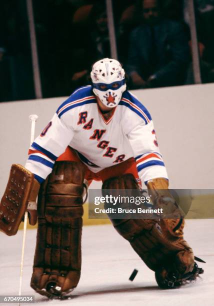 Goalie John Davidson of the New York Rangers makes the save during an NHL game circa February, 1980 at Madison Square Garden in New York, New York.