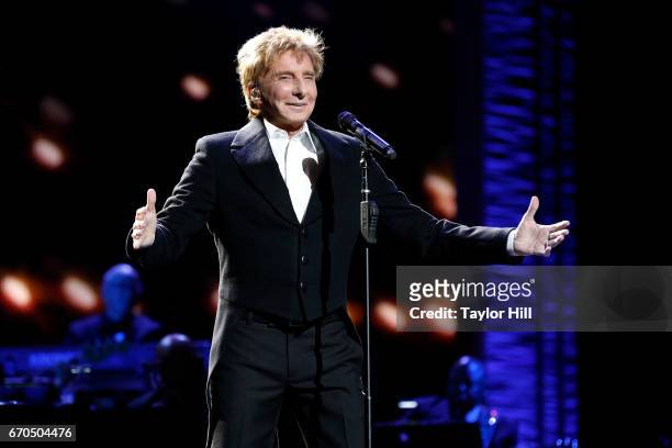 Barry Manilow performs during the 2017 Tribeca Film Festival Opening Gala premiere of "Clive Davis: The Soundtrack of our Lives" at Radio City Music...