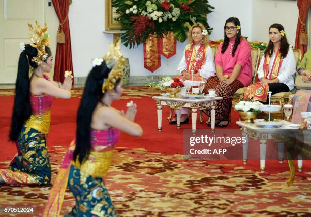 The daughters of US Vice President Mike Pence, Charlotte and Audrey , sit with the daughter of Indonesia's President Joko Widodo, Kahiyang Ayu , as...