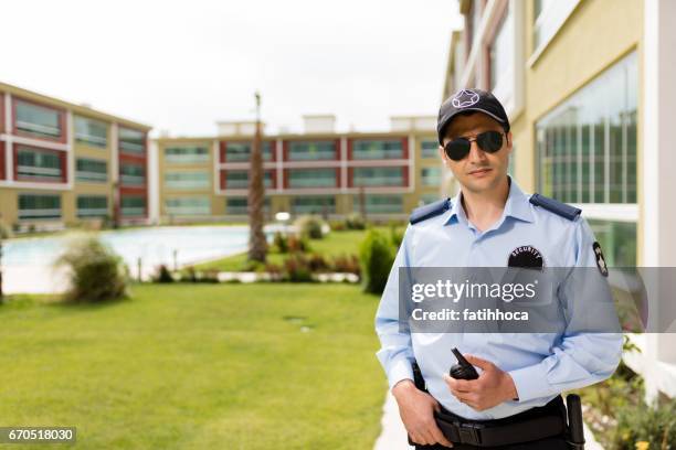 security guard - guarding building stock pictures, royalty-free photos & images