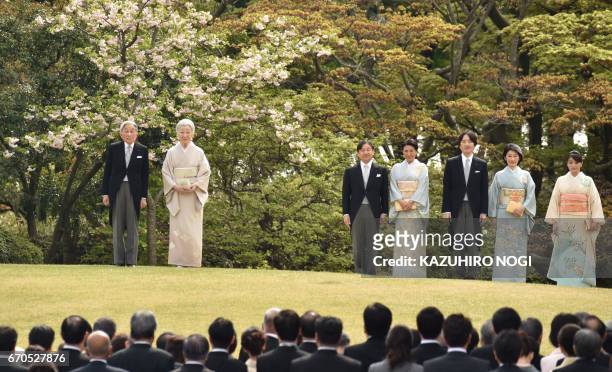 Japan's Emperor Akihito and Empress Michiko with members of the royal family attend the spring garden party at the Akasaka Palace imperial garden in...