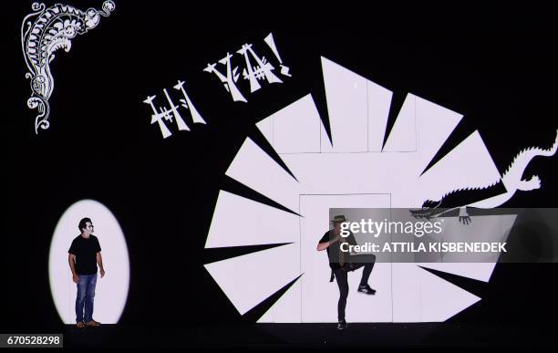 Australian born tenor Adrian Strooper in the role of 'Tamino' performs with Norwegian baritone Tom Erik Lie in the role 'Papageno' on stage of Erkel...