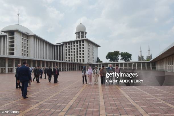 Vice President Mike Pence , his wife Karen and their daughters Charlotte and Audrey , Muhammad Muzammil Basyuni and Nasarudin Umar from the Istiqlal...