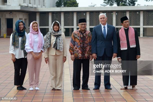 Vice President Mike Pence , his wife Karen and their daughters Charlotte and Audrey , Muhammad Muzammil Basyuni and Nasarudin Umar from the Istiqlal...