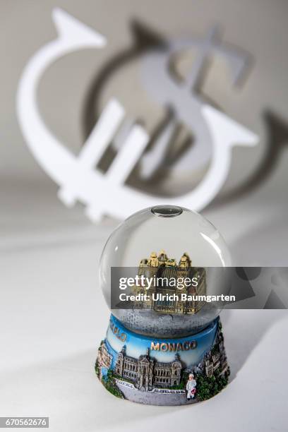 Symbol photo on the topics tax oasis, banking secrecy, tax treaties, tax investigation, tax authorities etc. The photo shows a Monaco snow globe and...