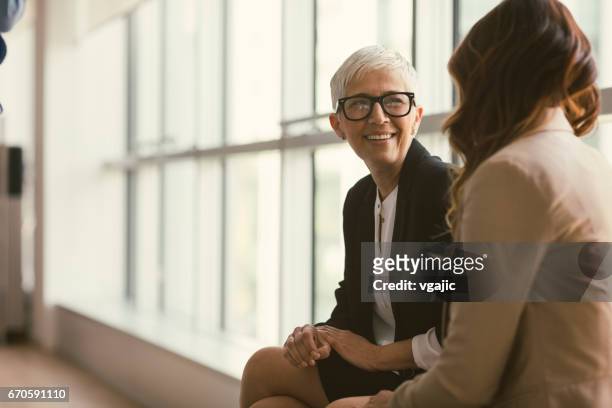 business people in the office - talking stock pictures, royalty-free photos & images
