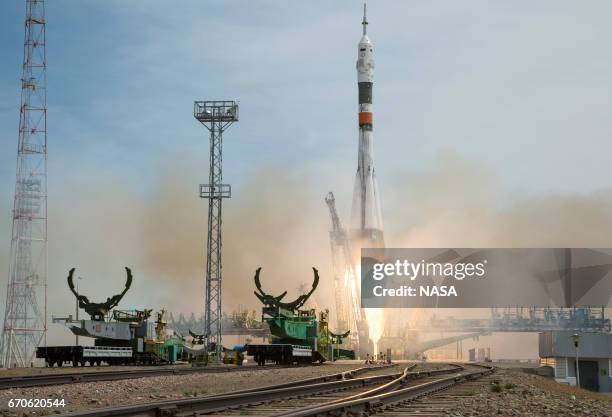 In this handout provided by NASA, the Soyuz MS-04 rocket carrying Expedition 51 Soyuz Commander Fyodor Yurchikhin of Roscosmos and Flight Engineer...