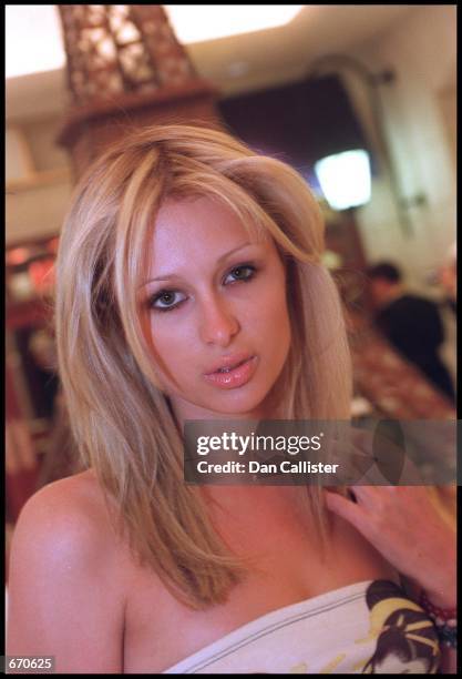 Paris Hilton a year older than screen legend Elizabeth Taylor when Elizabeth married Paris'' grandfather, Conrad "Nicky" Hilton Jr, poses in Las...