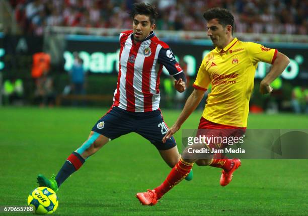 Rodolfo Pizarro of Chivas fights for the ball with Facundo Erpen of Morelia during the Final match between Chivas and Morelia as part of the Copa MX...