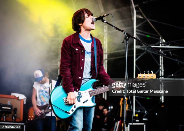 Bassist and vocalist Gary Jarman of English indie rock group The Cribs performing live on stage at Y Not Festival in Derbyshire, on July 29, 2016.