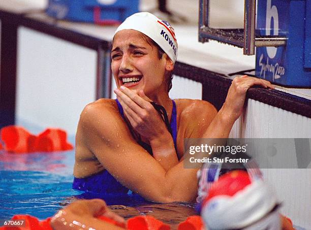 Kristy Kowal of the USA celebrates in the water September 21, 2000 after winning the silver medal win in the women's 200m breaststroke final at the...