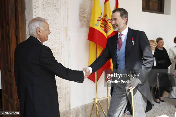 King Felipe of Spain greets the Catalan writer Eduardo Mendoza at the Cervantes Award Ceremony to the Spanish writer Eduardo Mendoza at Alcala de...