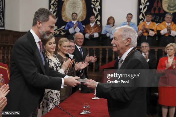 King Felipe of Spain greets the Catalan writer Eduardo Mendoza at the Cervantes Award Ceremony to the Spanish writer Eduardo Mendoza at Alcala de...