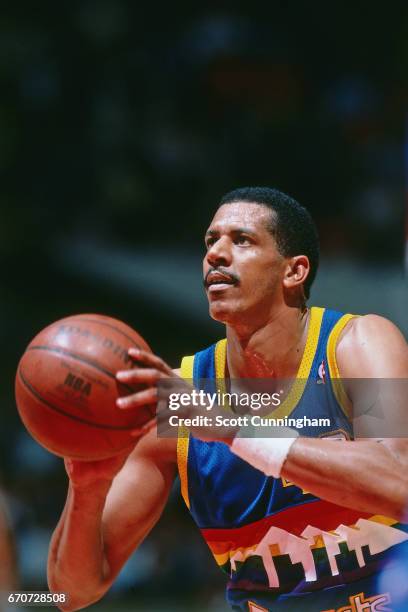 Wayne Cooper of the Denver Nuggets shoots against the Atlanta Hawks during a game played circa 1990 at the Omni in Atlanta, Georgia. NOTE TO USER:...