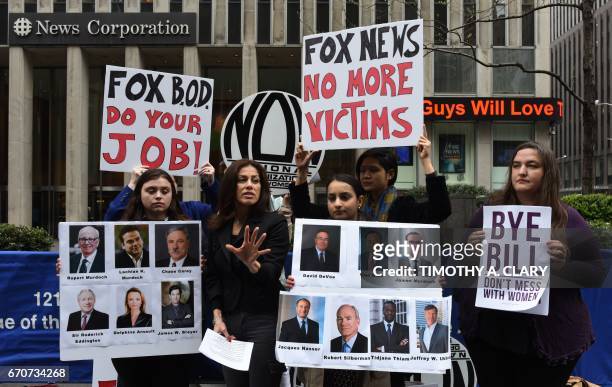 Protestors from the National Organization for Women of New York hold a protest in front of the News Corporation Headquarters in New York April 20 ,...