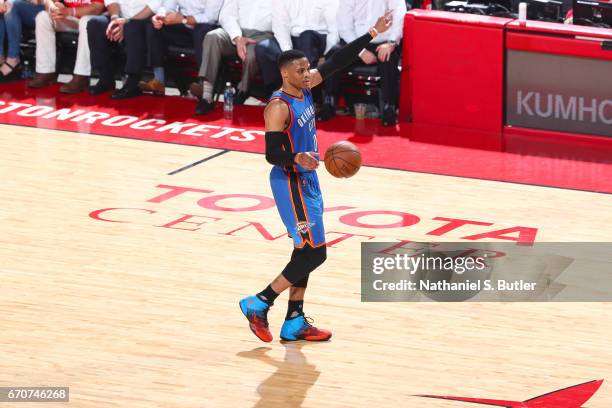 Russell Westbrook of the Oklahoma City Thunder dribbles the ball up court against the Houston Rockets during Game Two of the Western Conference...