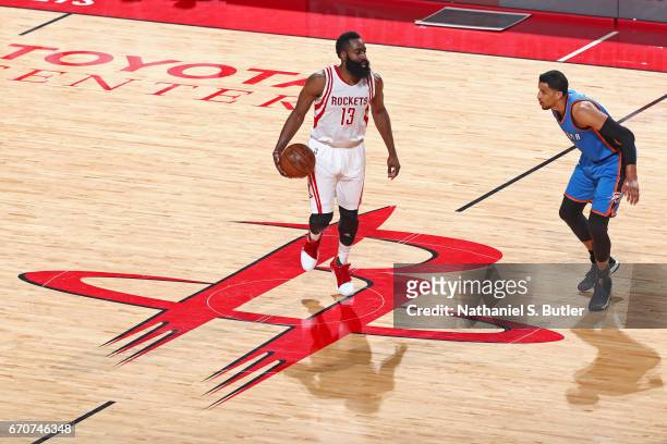 James Harden of the Houston Rockets dribbles the ball at mid court during Game Two of the Western Conference Quarterfinals against the Oklahoma City...