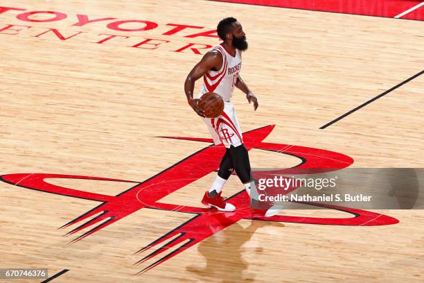 James Harden of the Houston Rockets dribbles the ball at mid court during Game Two of the Western Conference Quarterfinals against the Oklahoma City...