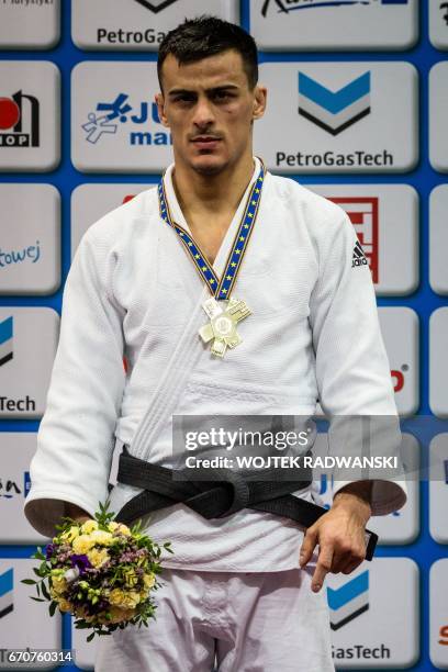 Ukrainia's Georgii Zantaraia celebrates winning the gold medal in the men's under 66kg competition of the European Judo Championships in Warsaw,...