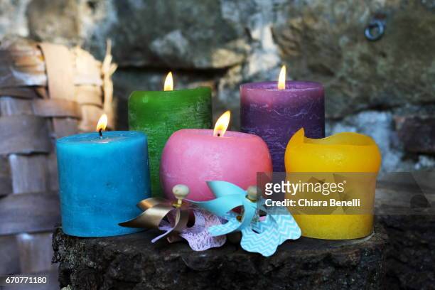 colorfull candles - crepuscolo stock-fotos und bilder
