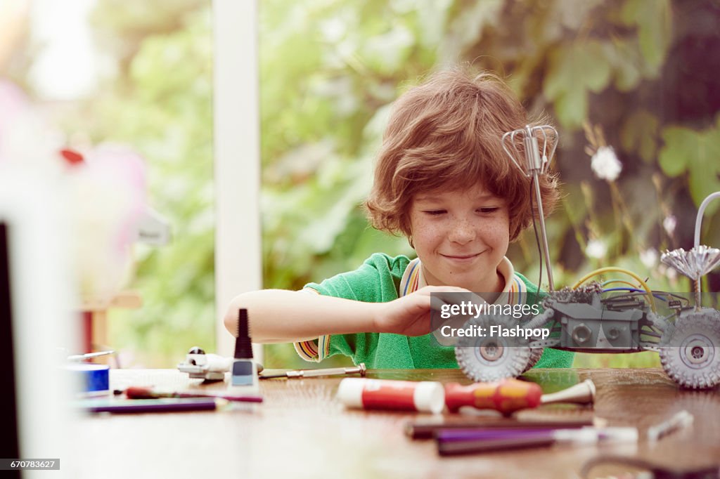 Portrait Of Child Being Creative And Making Things High-Res Stock Photo ...