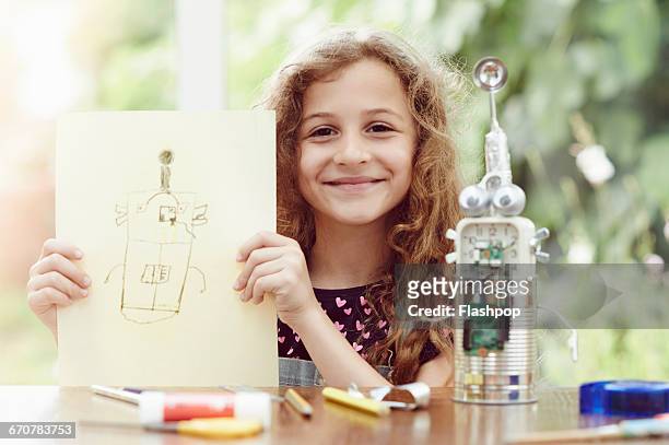 portrait of child being creative and making things - human age stock-fotos und bilder