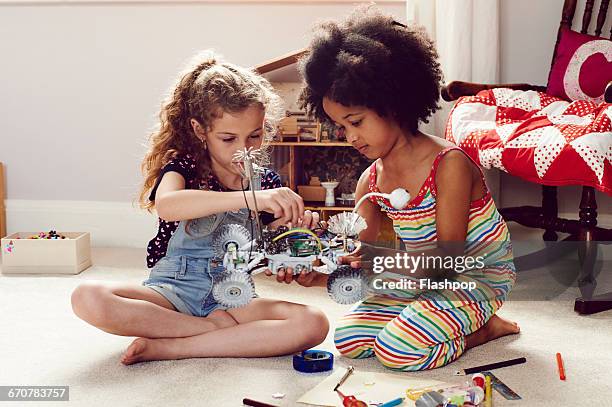 two children working together to make things - girl 6 7 stock pictures, royalty-free photos & images